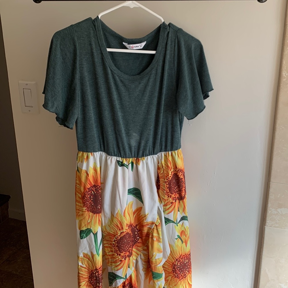 Green/sunflower midi dress.